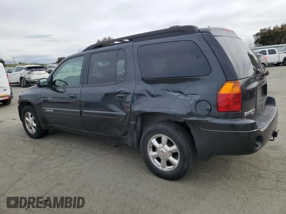 ✅ 2004 GMC Envoy SLE • VIN: 1GKES16S546100410 • Lot: 47873905. Listed on Copart with 223,685 mi. Free auction sales archive from the USA and detailed vehicle history report at DreamBid. Image 2.