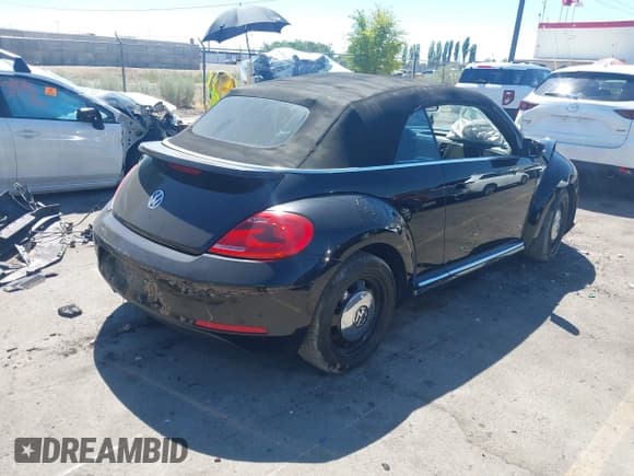 ✅ 2014 Volkswagen Beetle 1.8T • VIN: 3VW517AT6EM821755 • Лот: 42961048. Опубликован ранее на IAAI с пробегом 91 264 миль. Бесплатный доступ к архиву аукционных продаж из США и подробный отчёт об истории автомобиля на DreamBid. Изображение 4.