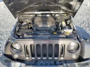 ✅ 2018 Jeep Wrangler Willys Wheeler W • VIN: 1C4AJWAGXJL852498 • Lot: 52866945. Listed on Copart with 90,515 mi. Free auction sales archive from the USA and detailed vehicle history report at DreamBid. Image 13.