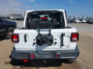 ✅ 2023 Jeep Wrangler Rubicon • VIN: 1C4HJXFG1PW600353 • Lot: 43338003. Listed on IAAI with 26,306 mi. Free auction sales archive from the USA and detailed vehicle history report at DreamBid. Image 16.