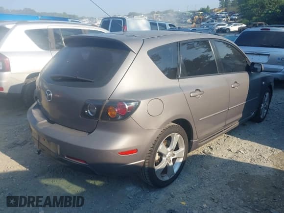 ✅ 2005 Mazda 3 s • VIN: JM1BK143851302909 • Lot: 43000889. Listed on IAAI with 209,240 mi. Free auction sales archive from the USA and detailed vehicle history report at DreamBid. Image 4.