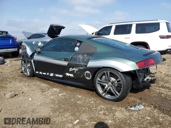 ✅ 2015 Audi R8 • VIN: WUAKNAFG7F7001816 • Лот: 52622535. Опубликован ранее на Copart с пробегом 97 829 миль. Бесплатный доступ к архиву аукционных продаж из США и подробный отчёт об истории автомобиля на DreamBid. Изображение 2.