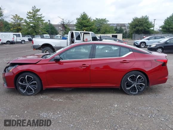 ✅ 2023 Nissan Altima SR • VIN: 1N4BL4CV8PN312424 • Lot: 43298119. Listed on IAAI with 24,928 mi. Free auction sales archive from the USA and detailed vehicle history report at DreamBid. Image 14.