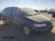 ✅ 2004 Honda Odyssey EX • VIN: 5FNRL18604B060185 • Lot: 87412525. Listed on Copart with 166,824 mi. Free auction sales archive from the USA and detailed vehicle history report at DreamBid. Image 4.
