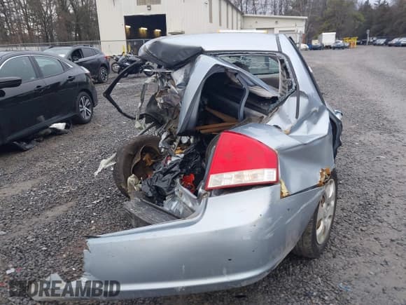 ✅ 2007 Kia Spectra EX • VIN: KNAFE122175452985 • Lot: 43790062. Listed on IAAI with 116,063 mi. Free auction sales archive from the USA and detailed vehicle history report at DreamBid. Image 16.