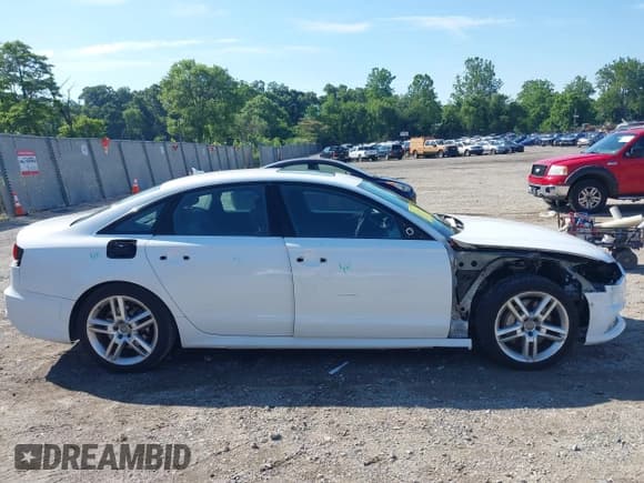 ✅ 2016 Audi A6 Premium Plus • VIN: WAUGFAFC9GN007446 • Lot: 42612462. Wystawiony na IAAI z przebiegiem 101 307 mil. Bezpłatny archiwum sprzedaży aukcyjnych z USA i szczegółowy raport historii pojazdu na DreamBid. Zdjęcie 14.