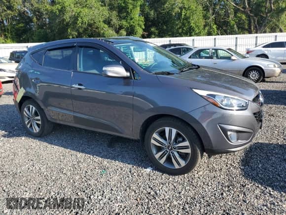 2015 Hyundai Tucson SE with VIN KM8JU3AG5FU977718, listed as a Copart auction lot 62511263 with 31,776 mi miles and . Bid and sale history available at DreamBid. Image 4.