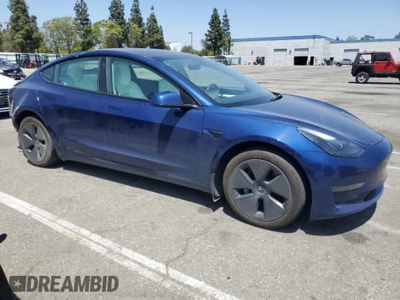 ✅ 2023 Tesla Model 3 • VIN: 5YJ3E1EAXPF599412 • Lot: 60316765. Wystawiony na Copart z przebiegiem 38 571 mil. Bezpłatny archiwum sprzedaży aukcyjnych z USA i szczegółowy raport historii pojazdu na DreamBid. Zdjęcie 4.