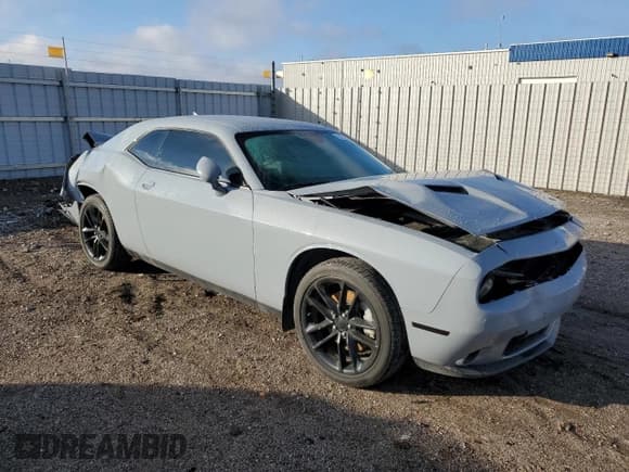 ✅ 2022 Dodge Challenger SXT • VIN: 2C3CDZGG7NH140773 • Lot: 78757424. Wystawiony na Copart z przebiegiem 22 886 mil. Bezpłatny archiwum sprzedaży aukcyjnych z USA i szczegółowy raport historii pojazdu na DreamBid. Zdjęcie 4.