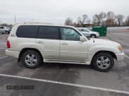 ✅ 2006 Lexus LX 470 • VIN: JTJHT00WX64005719 • Lot: 43793867. Listed on IAAI with 150,819 mi. Free auction sales archive from the USA and detailed vehicle history report at DreamBid. Image 13.