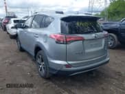 ✅ 2018 Toyota RAV4 XLE • VIN: 2T3WFREV1JW427878 • Lot: 42191031. Listed on IAAI with 97,264 mi. Free auction sales archive from the USA and detailed vehicle history report at DreamBid. Image 3.