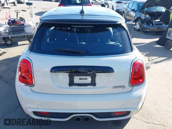 2017 MINI Hardtop Cooper S with VIN WMWXP7C57H3B93462, listed as a IAAI auction lot 43517920 with 56,050 mi miles and . Bid and sale history available at DreamBid. Image 17.