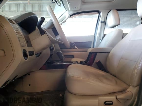 ✅ 2009 Ford Escape Hybrid • VIN: 1FMCU49329KB26671 • Lot: 46097485. Wystawiony na Copart z przebiegiem 133 823 mil. Bezpłatny archiwum sprzedaży aukcyjnych z USA i szczegółowy raport historii pojazdu na DreamBid. Zdjęcie 7.