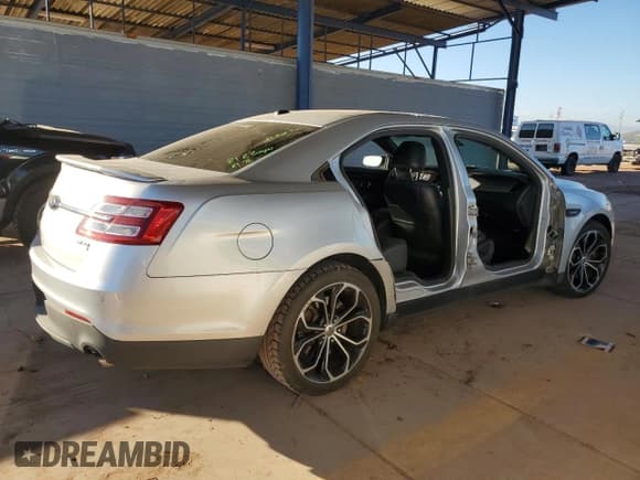 ✅ 2013 Ford Taurus SHO • VIN: 1FAHP2KT7DG190626 • Lot: 92644385. Listed on Copart with 138,731 mi. Free auction sales archive from the USA and detailed vehicle history report at DreamBid. Image 3.