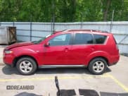 ✅ 2010 Mitsubishi Outlander ES • VIN: JA4AT2AW8AZ013032 • Lot: 42377377. Listed on IAAI with 135,411 mi. Free auction sales archive from the USA and detailed vehicle history report at DreamBid. Image 14.