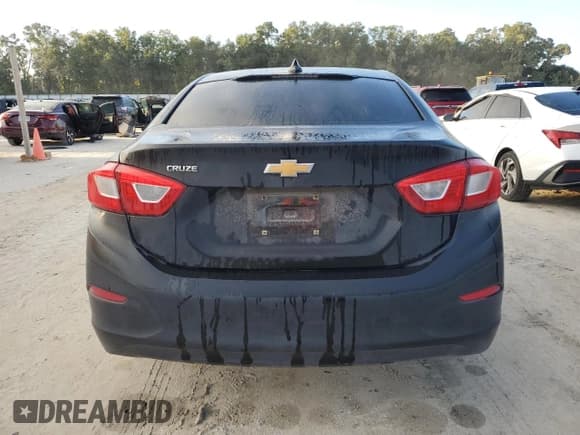 ✅ 2018 Chevrolet Cruze LS • VIN: 1G1BB5SM7J7203839 • Lot: 84742265. Listed on Copart with 87,543 mi. Free auction sales archive from the USA and detailed vehicle history report at DreamBid. Image 6.