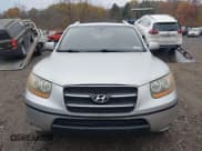 ✅ 2009 Hyundai Santa Fe SE • VIN: 5NMSH73E39H279698 • Lot: 43627061. Listed on IAAI with 185,779 mi. Free auction sales archive from the USA and detailed vehicle history report at DreamBid. Image 12.