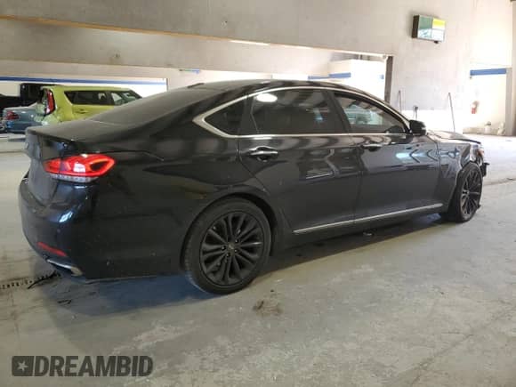 2016 Hyundai Genesis 3.8L z VIN KMHGN4JE9GU127474, wystawiony jako Copart lot #76671724 z przebiegiem 96 985 mil mil oraz Szkoda całkowita • Salvage title. Historia ofert i sprzedaży dostępna na DreamBid. Obrazek 3.