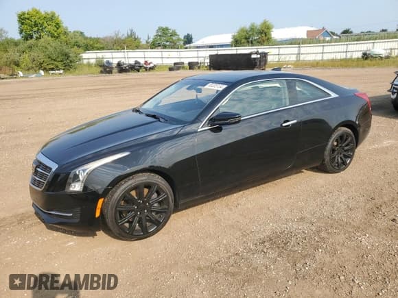 ✅ 2015 Cadillac ATS Standard AWD • VIN: 1G6AG1RX9F0118971 • Lot: 65205134. Listed on Copart with 94,555 mi. Free auction sales archive from the USA and detailed vehicle history report at DreamBid. Image 1.