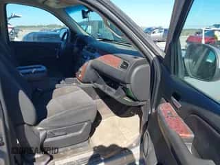 2007 Chevrolet Suburban LT z VIN 3GNFC16057G186159, wystawiony jako IAAI lot #43593265 z przebiegiem 166 801 mil mil oraz . Historia ofert i sprzedaży dostępna na DreamBid. Obrazek 5.