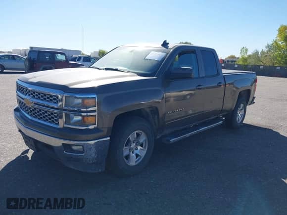 2015 Chevrolet Silverado 1500 LT z VIN 1GCVKREH4FZ272252, wystawiony jako IAAI lot #43392960 z przebiegiem 204 810 mil mil oraz . Historia ofert i sprzedaży dostępna na DreamBid. Obrazek 17.