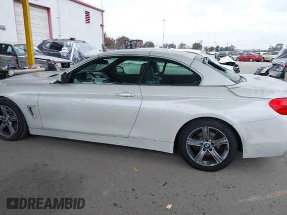 ✅ 2015 BMW 4 Series 428i • VIN: WBA3V7C5XFP772663 • Лот: 42101012. Опубликован ранее на IAAI с пробегом 75 901 миль. Бесплатный доступ к архиву аукционных продаж из США и подробный отчёт об истории автомобиля на DreamBid. Изображение 14.