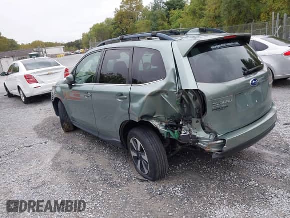2018 Subaru Forester Limited with VIN JF2SJAJC7JH599214, listed as a IAAI auction lot 43324463 with 87,024 mi miles and . Bid and sale history available at DreamBid. Image 3.
