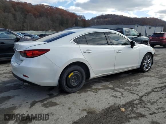 ✅ 2017 Mazda 6 Touring • VIN: JM1GL1V54H1110992 • Лот: 93571585. Опубликован ранее на Copart с пробегом 161 401 миль. Бесплатный доступ к архиву аукционных продаж из США и подробный отчёт об истории автомобиля на DreamBid. Изображение 3.