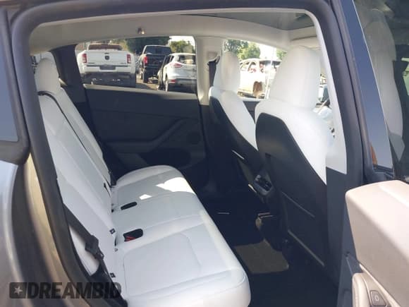 ✅ 2025 Tesla Model Y Performance • VIN: 7SAYGDEF7SF261071 • Lot: 42738857. Listed on IAAI with 7,305 mi. Free auction sales archive from the USA and detailed vehicle history report at DreamBid. Image 8.