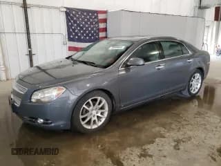 ✅ 2009 Chevrolet Malibu LTZ • VIN: 1G1ZK577994215182 • Lot: 75599644. Listed on Copart with 124,154 mi. Free auction sales archive from the USA and detailed vehicle history report at DreamBid. Image 1.