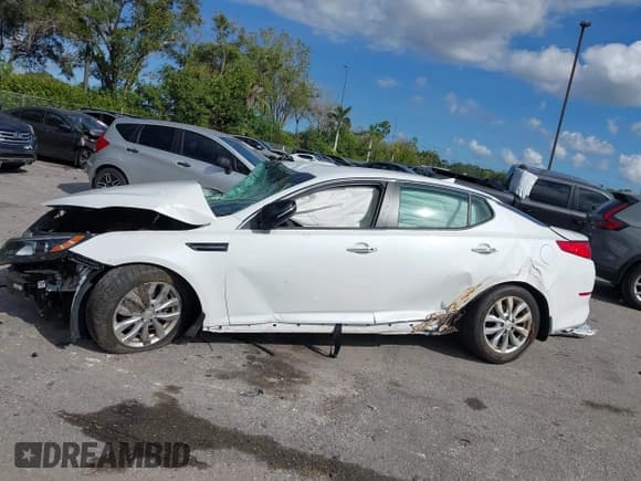 ✅ 2015 Kia Optima EX • VIN: 5XXGN4A79FG475804 • Lot: 43797297. Listed on IAAI with Not provided. Free auction sales archive from the USA and detailed vehicle history report at DreamBid. Image 13.