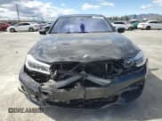 ✅ 2018 BMW 7 Series 750i • VIN: WBA7F0C5XJGM23016 • Лот: 51284255. Опубликован ранее на Copart с пробегом 69 460 миль. Бесплатный доступ к архиву аукционных продаж из США и подробный отчёт об истории автомобиля на DreamBid. Изображение 5.