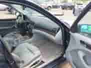 2003 BMW 3 Series 325xi с VIN WBAEU33423PM52020, выставлен на аукционе IAAI как лот 42488216 с пробегом 82 698 миль миль и . История ставок и продаж доступна на DreamBid. Изображение 5.