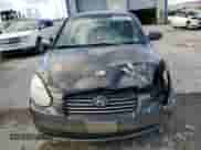 2007 Hyundai Accent GLS z VIN KMHCN46CX7U094863, wystawiony jako Copart lot #80229854 z przebiegiem 150 198 mil mil oraz Szkoda całkowita • Salvage title. Historia ofert i sprzedaży dostępna na DreamBid. Obrazek 5.