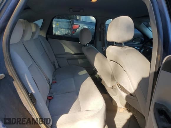 ✅ 2006 Chevrolet Impala LS • VIN: 2G1WB55K069402071 • Lot: 57056215. Wystawiony na Copart z przebiegiem 296 707 mil. Bezpłatny archiwum sprzedaży aukcyjnych z USA i szczegółowy raport historii pojazdu na DreamBid. Zdjęcie 10.