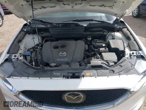 ✅ 2018 Mazda CX-5 Touring • VIN: JM3KFACM6J1409067 • Лот: 43716812. Опубликован ранее на IAAI с пробегом 76 489 миль. Бесплатный доступ к архиву аукционных продаж из США и подробный отчёт об истории автомобиля на DreamBid. Изображение 10.