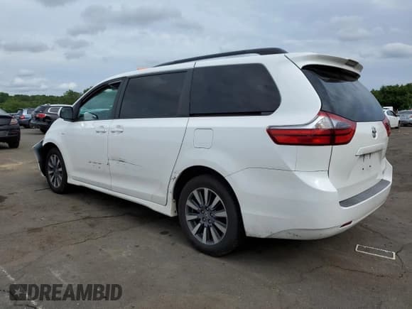 ✅ 2020 Toyota Sienna LE • VIN: 5TDJZ3DCXLS249696 • Lot: 64382785. Listed on Copart with 99,530 mi. Free auction sales archive from the USA and detailed vehicle history report at DreamBid. Image 2.