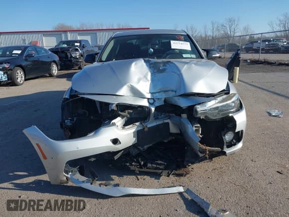 ✅ 2016 BMW 3 Series 320i xDrive • VIN: WBA8E5G52GNT93013 • Lot: 43754573. Listed on IAAI with 104,567 mi. Free auction sales archive from the USA and detailed vehicle history report at DreamBid. Image 12.