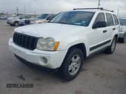 ✅ 2006 Jeep Grand Cherokee Laredo • VIN: 1J4GR48KX6C298060 • Lot: 43664456. Listed on IAAI with 231,008 mi. Free auction sales archive from the USA and detailed vehicle history report at DreamBid. Image 2.