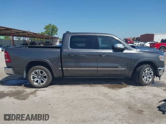 2023 Ram 1500 Limited with VIN 1C6SRFHT9PN583656, listed as a IAAI auction lot 42789248 with 50,276 mi miles and . Bid and sale history available at DreamBid. Image 14.