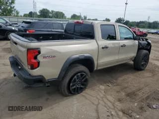 ✅ 2023 Chevrolet Colorado 4WD Trail Boss • VIN: 1GCPTEEK3P1263830 • Лот: 64741514. Опубликован ранее на Copart с пробегом 6 897 миль. Бесплатный доступ к архиву аукционных продаж из США и подробный отчёт об истории автомобиля на DreamBid. Изображение 3.