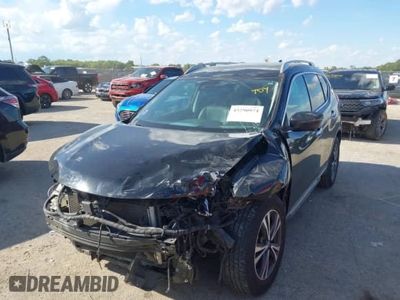 ✅ 2017 Nissan Rogue SL • VIN: 5N1AT2MT9HC880407 • Lot: 43290974. Listed on IAAI with 88,664 mi. Free auction sales archive from the USA and detailed vehicle history report at DreamBid. Image 18.