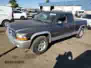 2002 Dodge Dakota SLT с VIN 1B7GL42X72S584170, выставлен на аукционе Copart как лот 77125564 с пробегом Не указан миль и Списание • Salvage title. История ставок и продаж доступна на DreamBid. Изображение 1.