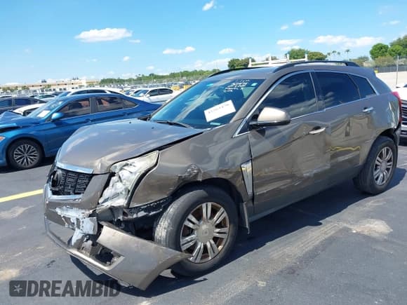✅ 2015 Cadillac SRX • VIN: 3GYFNAE35FS642004 • Lot: 42263470. Listed on IAAI with 94,968 mi. Free auction sales archive from the USA and detailed vehicle history report at DreamBid. Image 16.