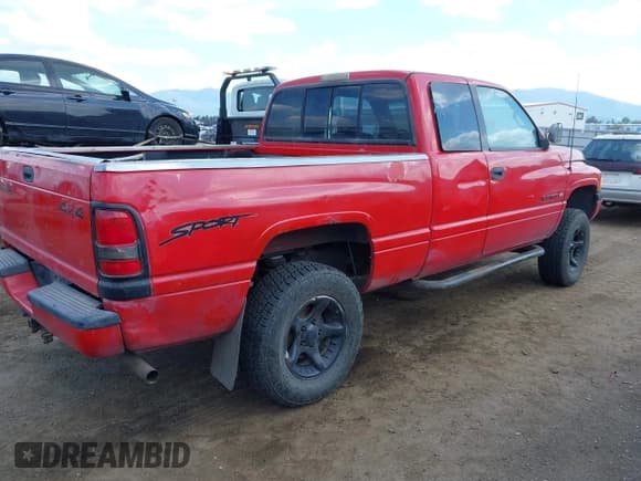✅ 1997 Dodge 1500 • VIN: 1B7HF13Z2VJ525760 • Lot: 42565456. Listed on IAAI with 218,390 mi. Free auction sales archive from the USA and detailed vehicle history report at DreamBid. Image 4.
