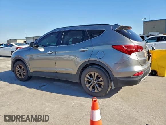 ✅ 2015 Hyundai Santa Fe • VIN: 5XYZU3LB7FG274910 • Лот: 91034995. Опубликован ранее на Copart с пробегом 163 728 миль. Бесплатный доступ к архиву аукционных продаж из США и подробный отчёт об истории автомобиля на DreamBid. Изображение 2.