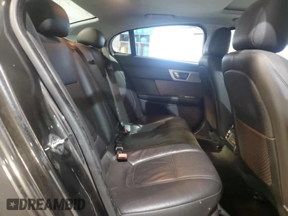 ✅ 2014 Jaguar XF SC • VIN: SAJWJ0EF2E8U09115 • Лот: 91767285. Опубликован ранее на Copart с пробегом 80 403 миль. Бесплатный доступ к архиву аукционных продаж из США и подробный отчёт об истории автомобиля на DreamBid. Изображение 10.