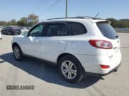 ✅ 2012 Hyundai Santa Fe Limited • VIN: 5XYZK4AG0CG144702 • Lot: 75204044. Listed on Copart with 173,296 mi. Free auction sales archive from the USA and detailed vehicle history report at DreamBid. Image 2.