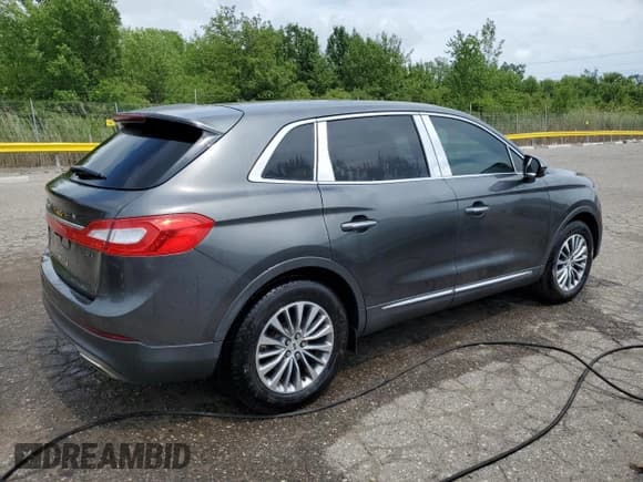 ✅ 2017 Lincoln MKX Select • VIN: 2LMPJ6KP1HBL48487 • Лот: 65281845. Опубликован ранее на Copart с пробегом 95 741 миль. Бесплатный доступ к архиву аукционных продаж из США и подробный отчёт об истории автомобиля на DreamBid. Изображение 3.