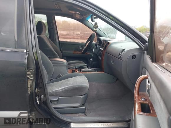 ✅ 2003 Kia Sorento LX • VIN: KNDJD733535047202 • Lot: 42016917. Listed on IAAI with 130,050 mi. Free auction sales archive from the USA and detailed vehicle history report at DreamBid. Image 5.